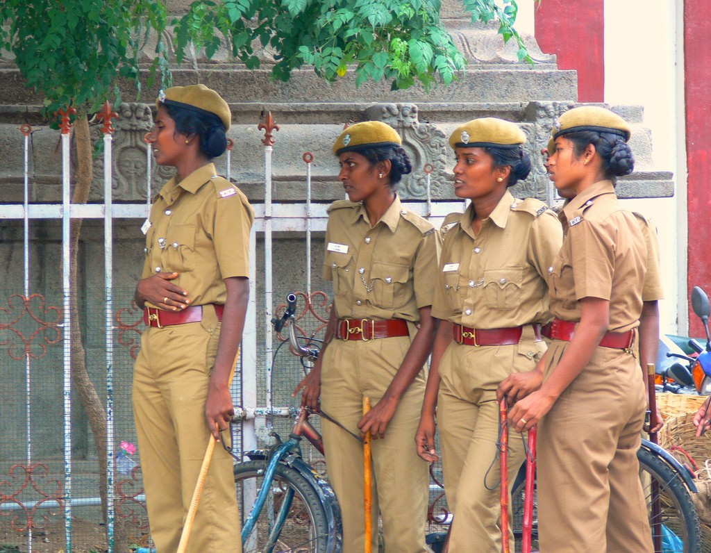 Four policewomen, standing.