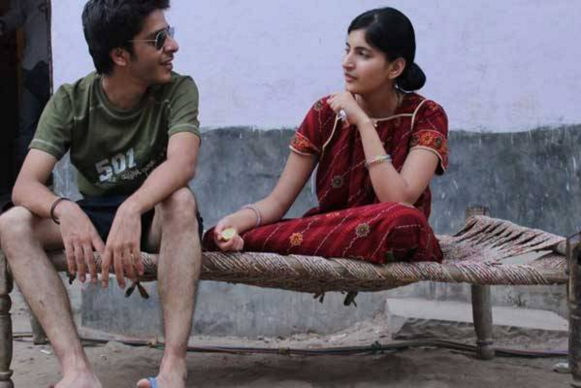 Behind the scenes at 'Titli': Actors who play Titli and Neelu sit on a charpoy.