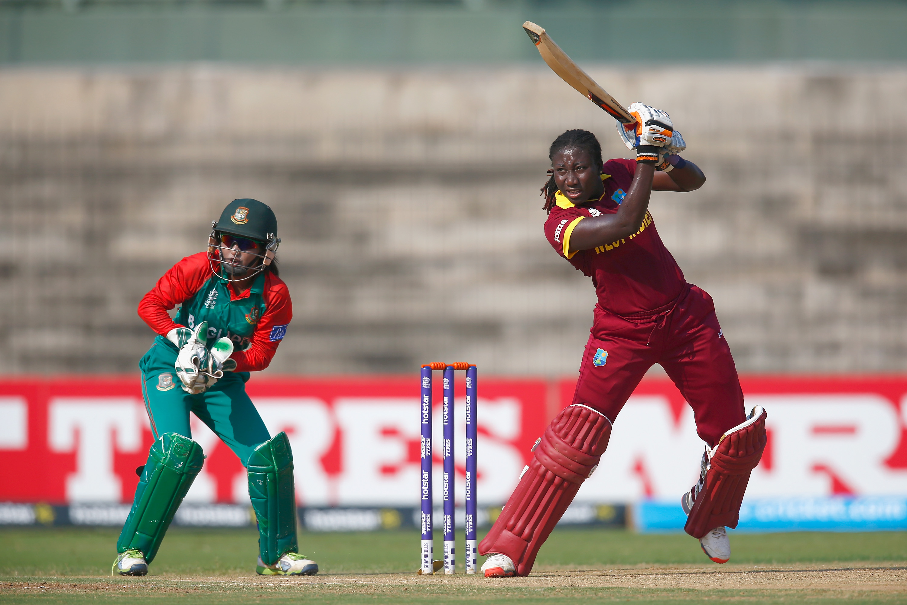 "CHENNAI, INDIA - MARCH 20: Stafanie Taylor, Captain of the West Indies in action with Nigar Sultana of Bangladesh during the Women's ICC World Twenty20 India 2016 Group B match between West Indies and Bangladesh at the Chidambaram Stadium on March 20, 2016 in Chennai, India. (Photo by Christopher Lee-IDI/IDI via Getty Images)"